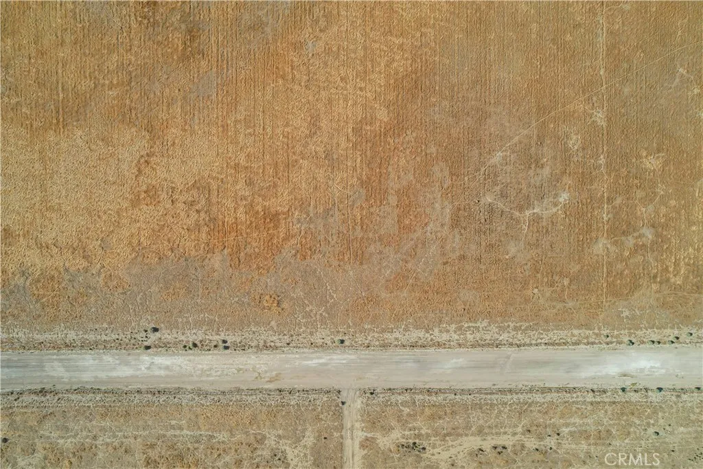 0 West Cor Avenue Lancaster, CA 93536 - Photo 11 of 28 a bathroom with a shower curtain