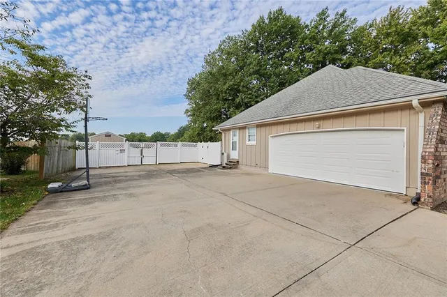 $415,000 | 1017 Johnston Drive, Raymore, MO 64083