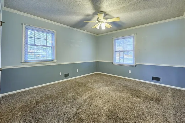 $415,000 | 1017 Johnston Drive, Raymore, MO 64083