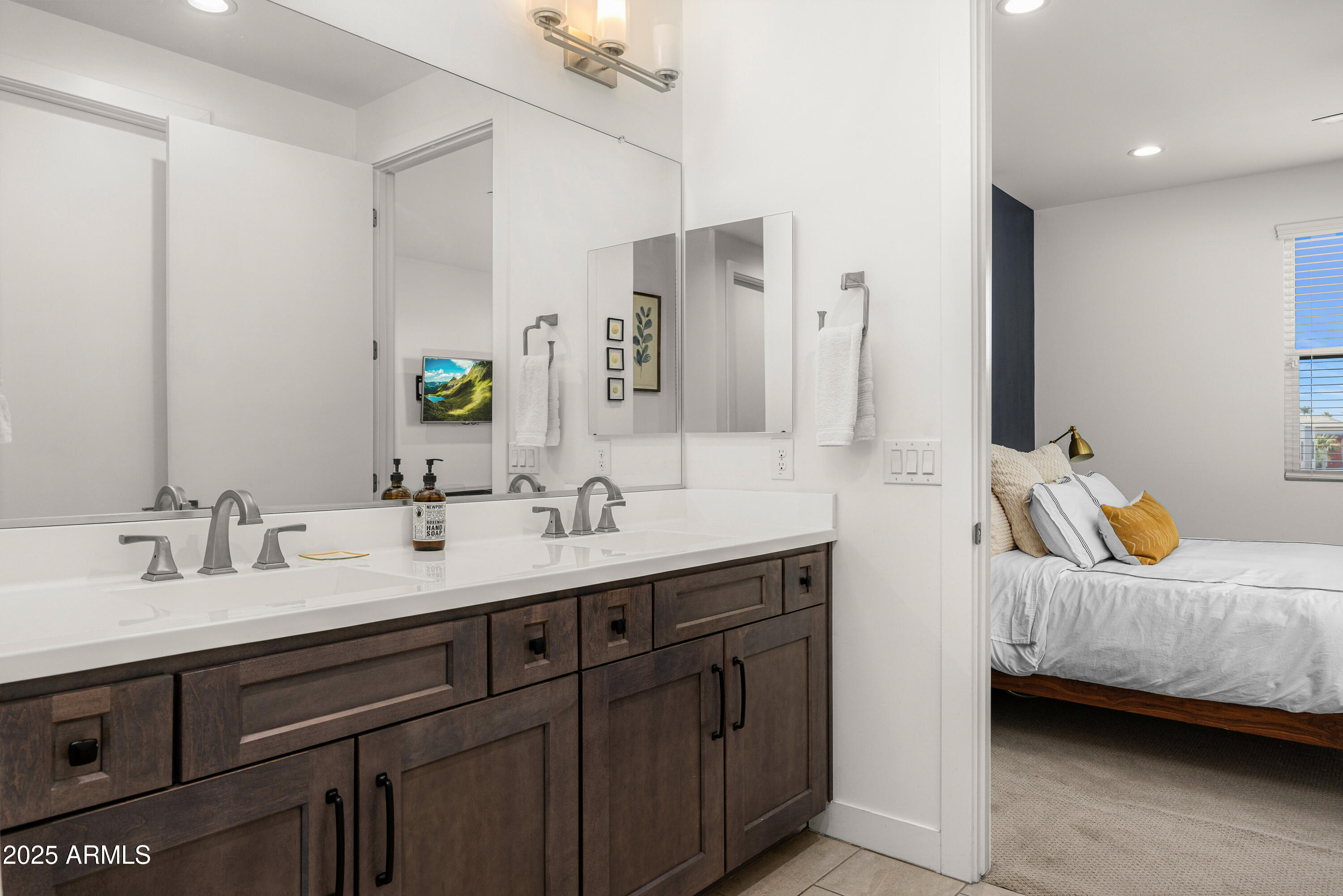 3200 North 39th Street, Unit 11 Phoenix, AZ 85018 - Photo 13 of 24 a en suite bathroom with a double vanity sink and mirror
