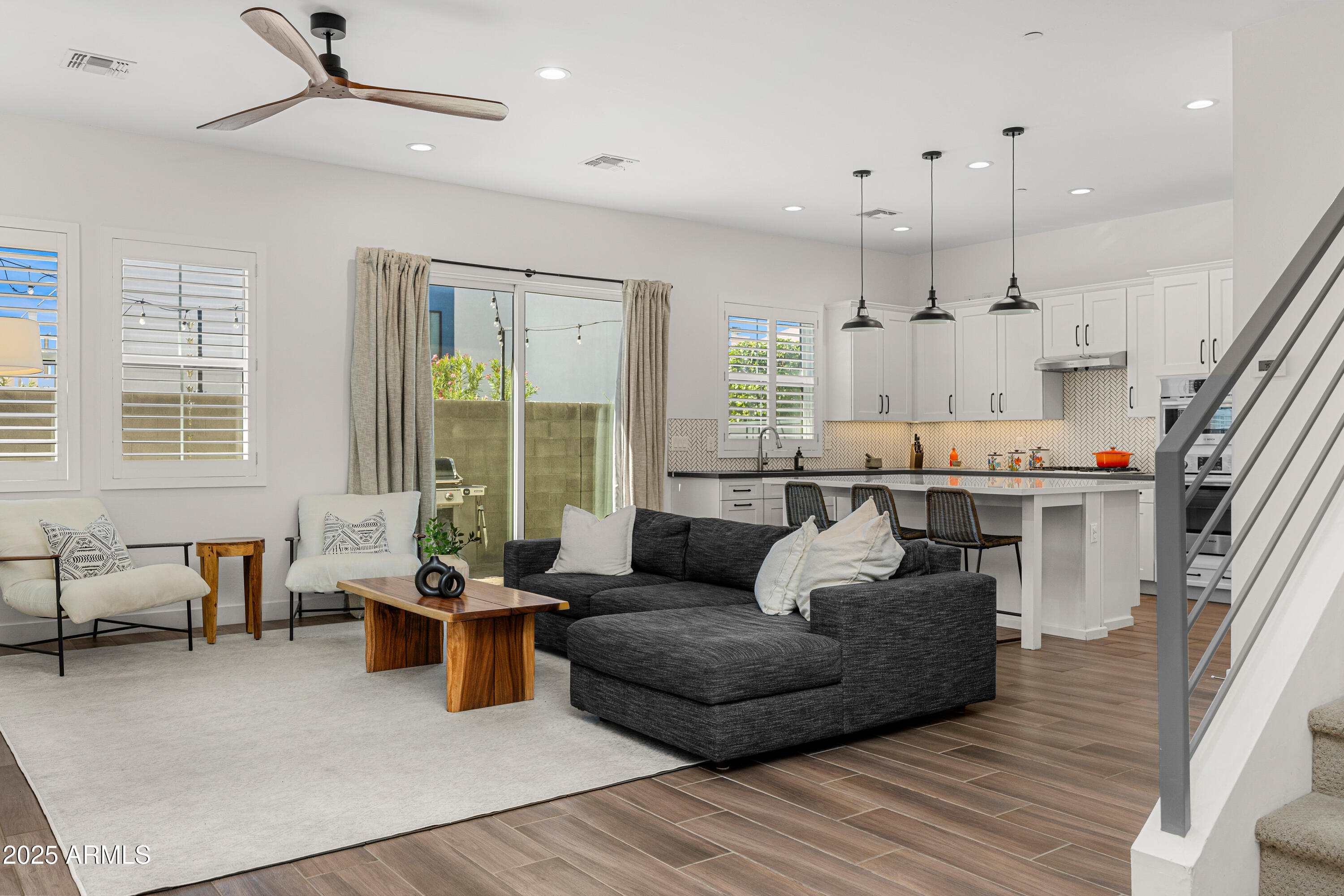 3200 North 39th Street, Unit 11 Phoenix, AZ 85018 - Photo 4 of 24 a living room with furniture and a large window