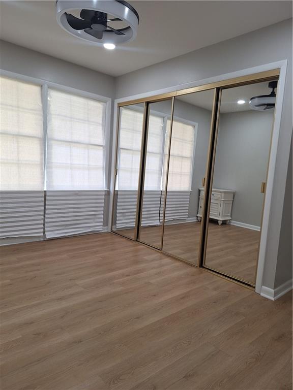 1605 Brockett Road Tucker, GA 30084 - Photo 5 of 12 a view of an empty room with a window