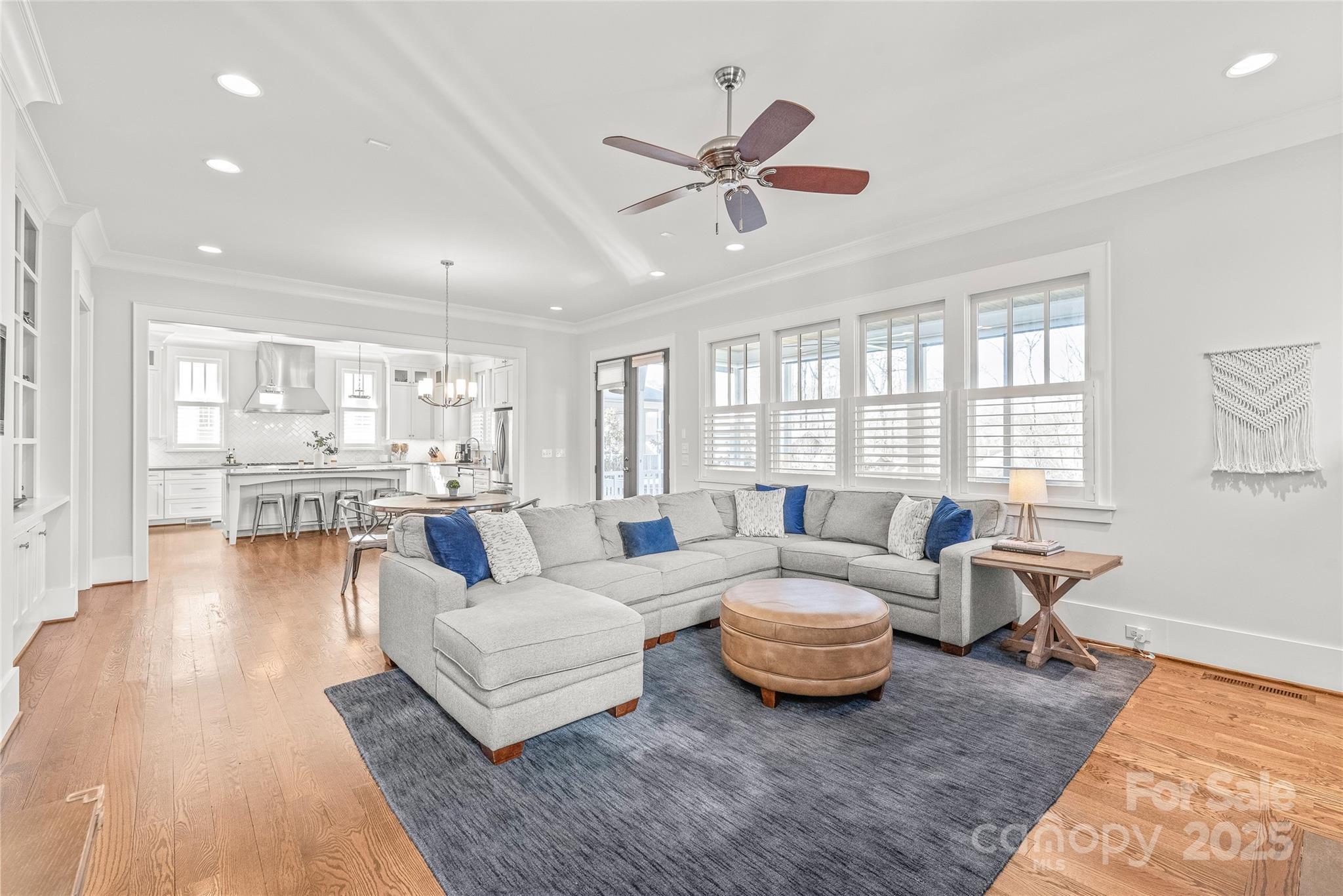 5717 Closeburn Road Charlotte, NC 28210 - Photo 13 of 40 a living room with furniture and a large window