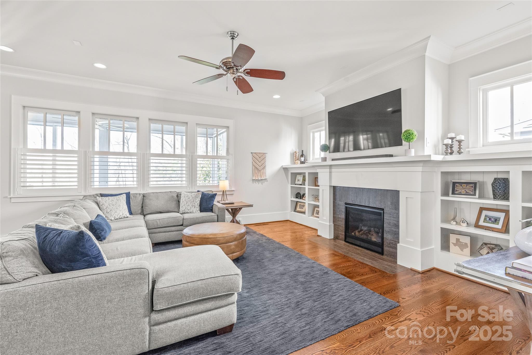 5717 Closeburn Road Charlotte, NC 28210 - Photo 14 of 40 a living room with furniture and a fireplace