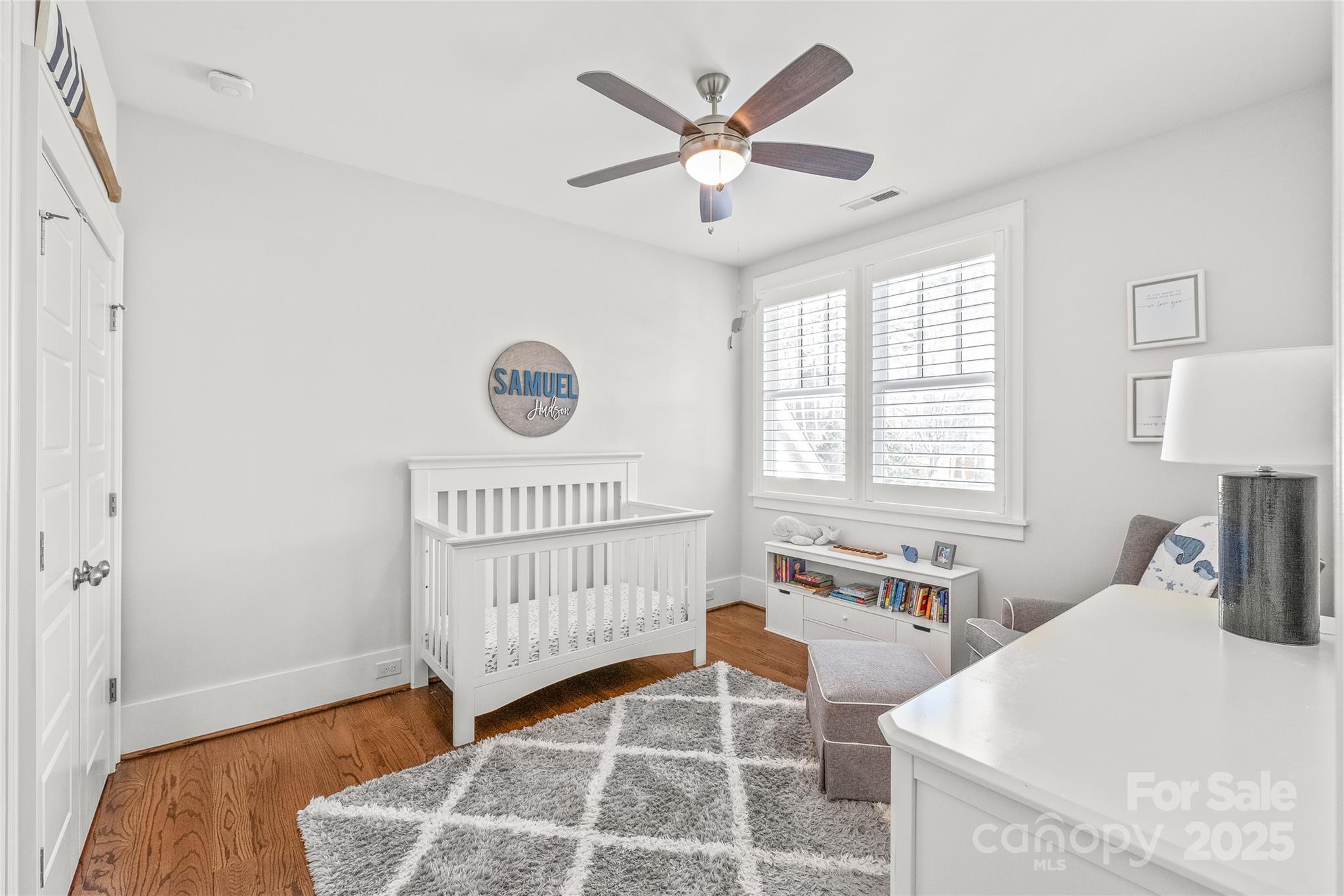 5717 Closeburn Road Charlotte, NC 28210 - Photo 30 of 40 a bedroom with a bed and a table in it