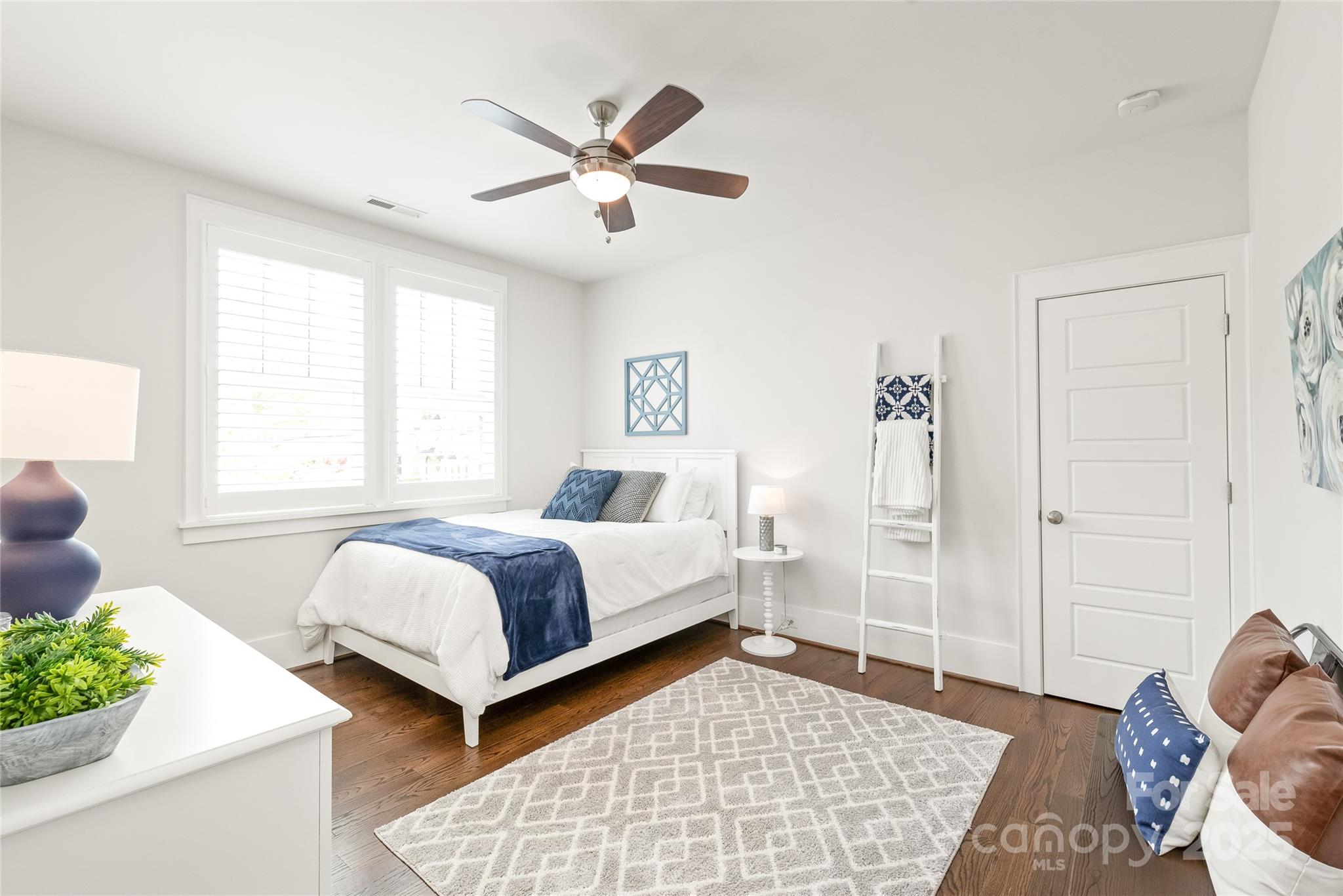 5717 Closeburn Road Charlotte, NC 28210 - Photo 31 of 40 a bedroom with a bed and window