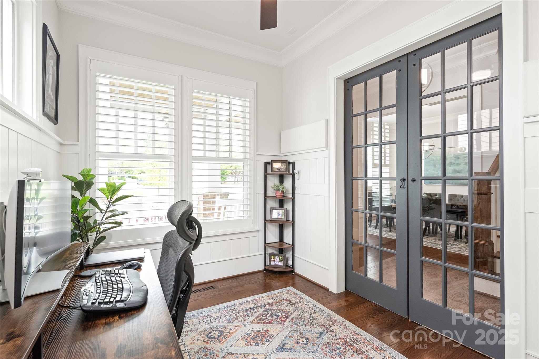 5717 Closeburn Road Charlotte, NC 28210 - Photo 7 of 40 a view of a livingroom with furniture and a potted plant