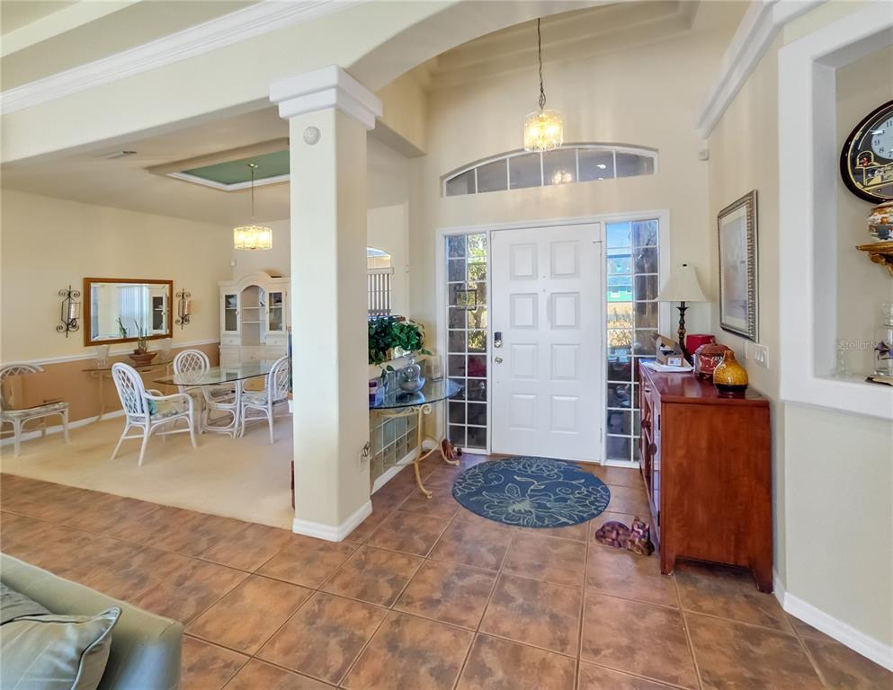 77 Hickory Loop Ocala, FL 34472 - Photo 5 of 50 a view of a livingroom with furniture and a ceiling fan