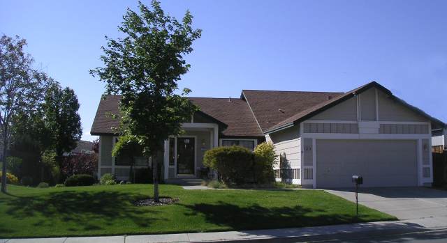 5728 Simons Drive Reno, NV 89523 - Photo 1 of 4 a front view of house with a garden