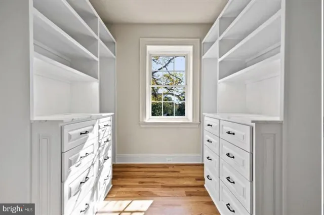 a bathroom with a sink a mirror and a bathtub