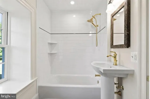 a view of a lake with beach and outdoor space