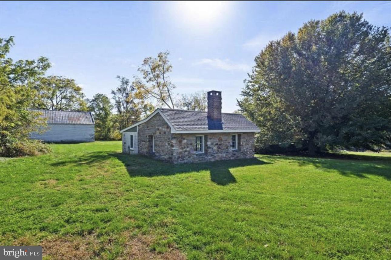 16131 Old York Road Monkton, MD 21111 - Photo 29 of 31 a view of a house with a big yard potted plants and a large tree