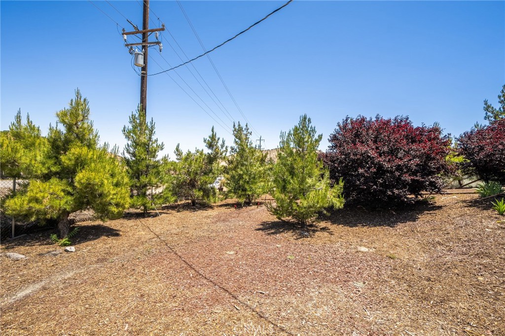 7575 Rancho Road Pinon Hills, CA 92397 - Photo 27 of 38 a view of a pathway with a yard