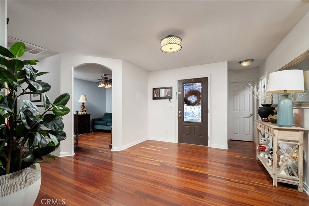 7575 Rancho Road Pinon Hills, CA 92397 - Photo 6 of 38 a view interior of a house and kitchen with wooden floor