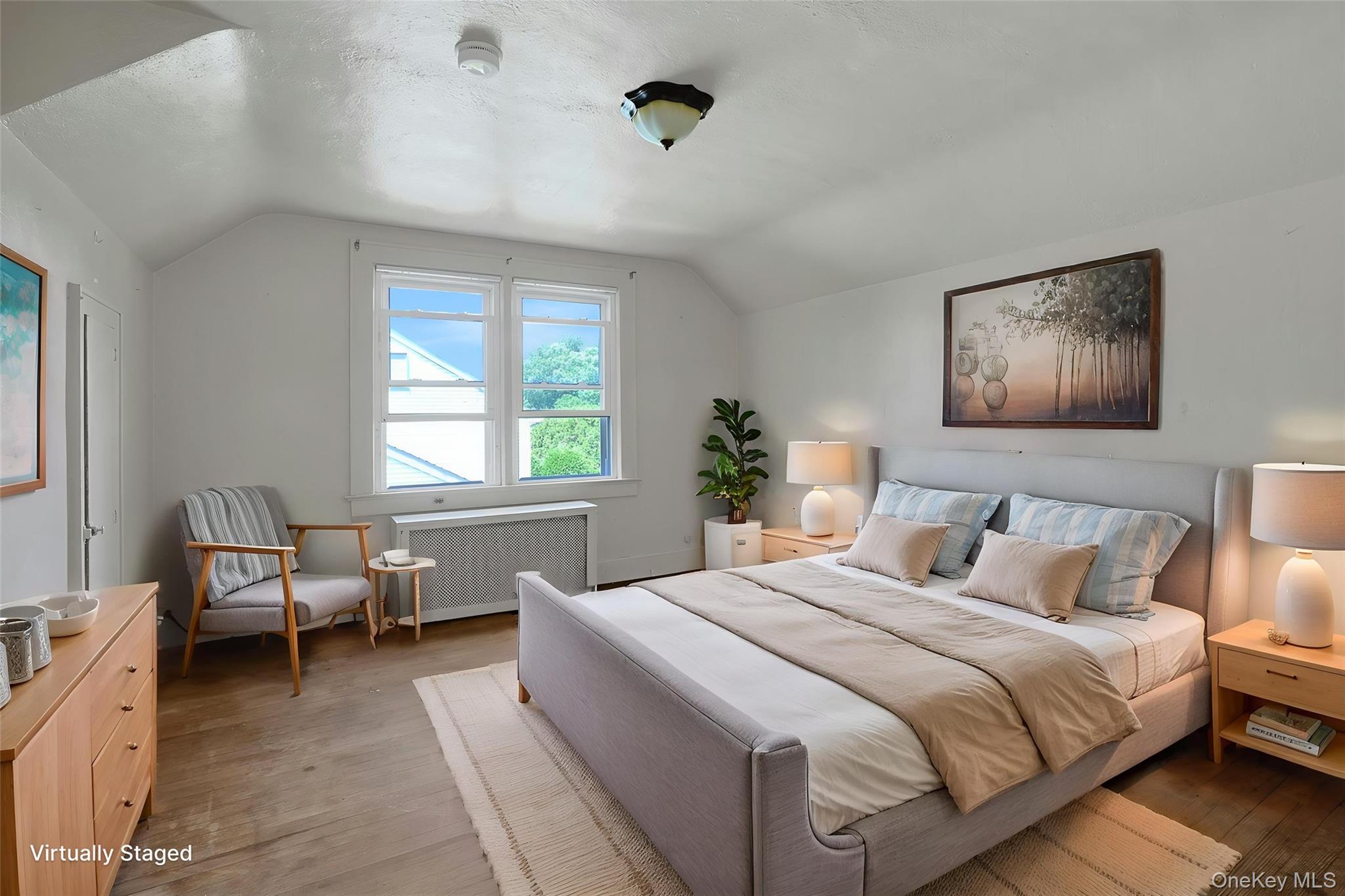 333 South Middletown Road Nanuet, NY 10954 - Photo 18 of 22 a bedroom with a bed and wooden floor