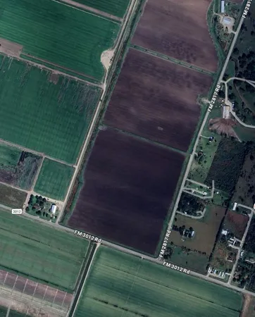 a view of a backyard with sitting area