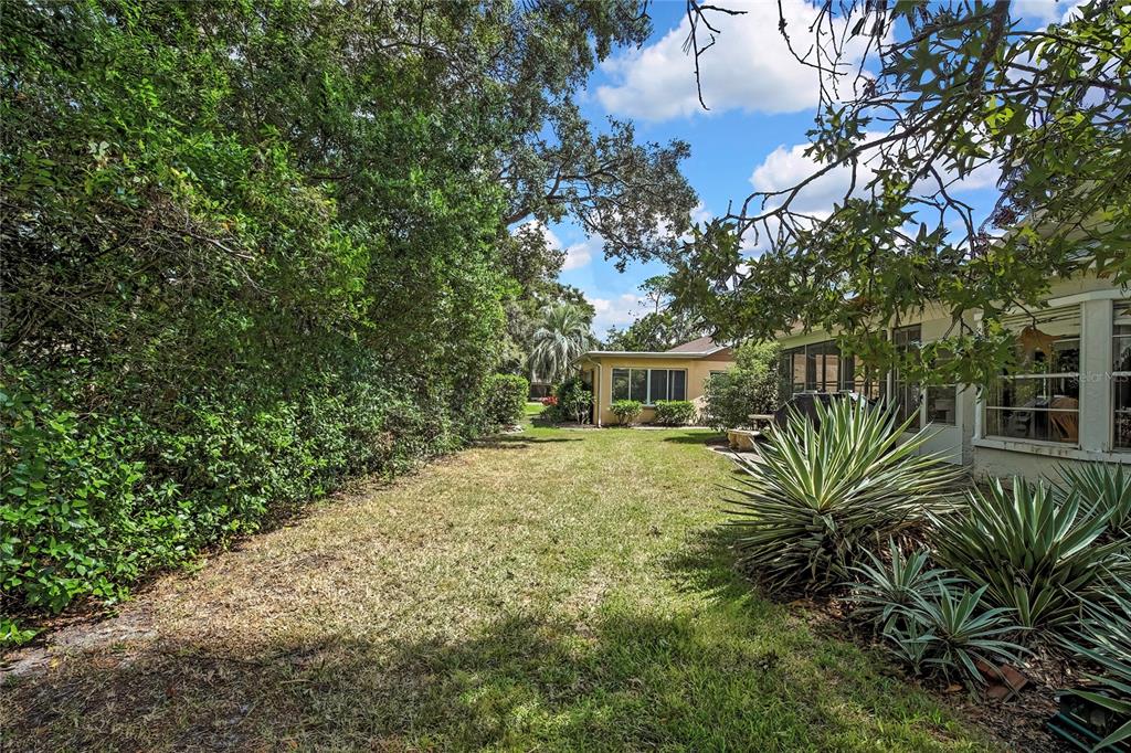 6517 Ocean Pines Lane Spring Hill, FL 34606 - Photo 31 of 72 a view of a yard in front of house