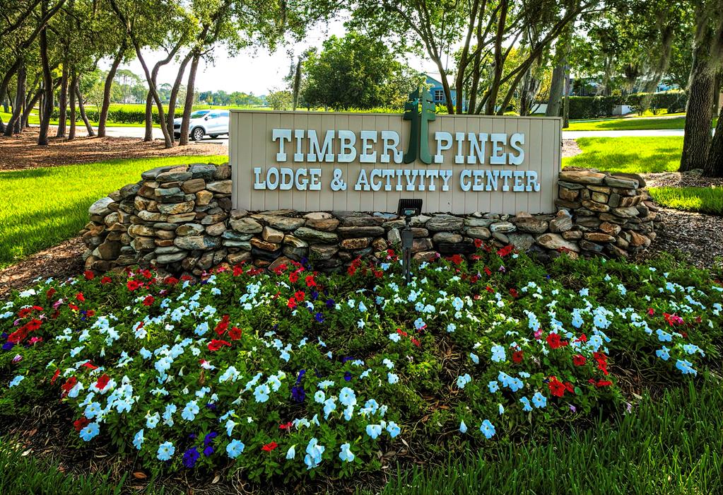 6517 Ocean Pines Lane Spring Hill, FL 34606 - Photo 59 of 72 a sign on the side of a road