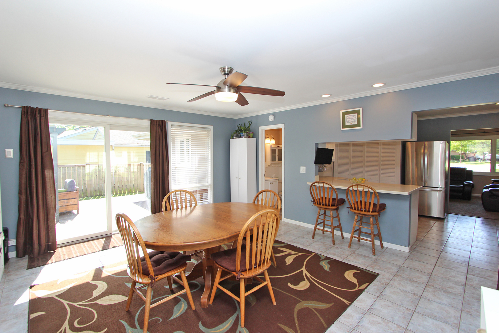 43 Golfview Road Lake Zurich, IL 60047 - Photo 11 of 35 a dining room with furniture a chandelier and wooden floor