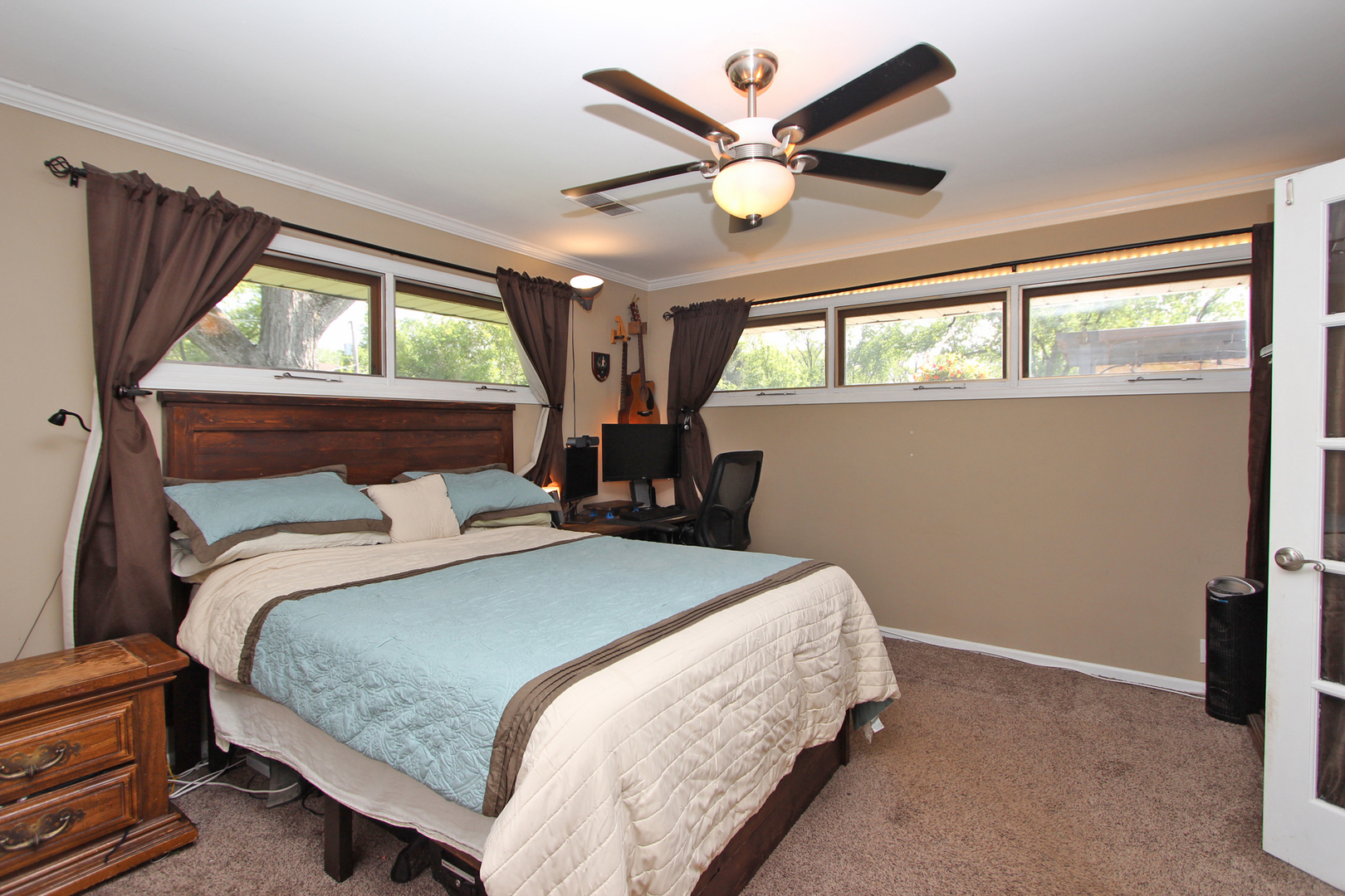 43 Golfview Road Lake Zurich, IL 60047 - Photo 15 of 35 a bedroom with a large bed and a large window