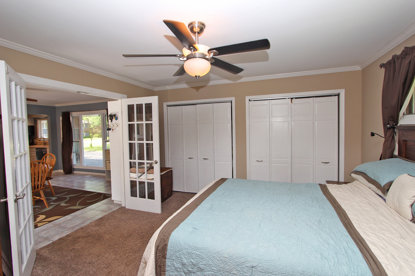43 Golfview Road Lake Zurich, IL 60047 - Photo 17 of 35 a bedroom with furniture and a large window