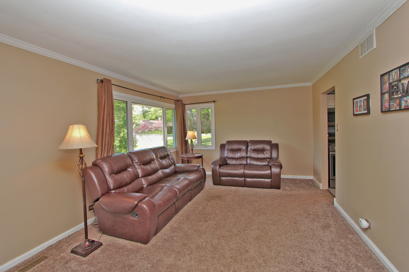43 Golfview Road Lake Zurich, IL 60047 - Photo 2 of 35 a living room with furniture and a large window
