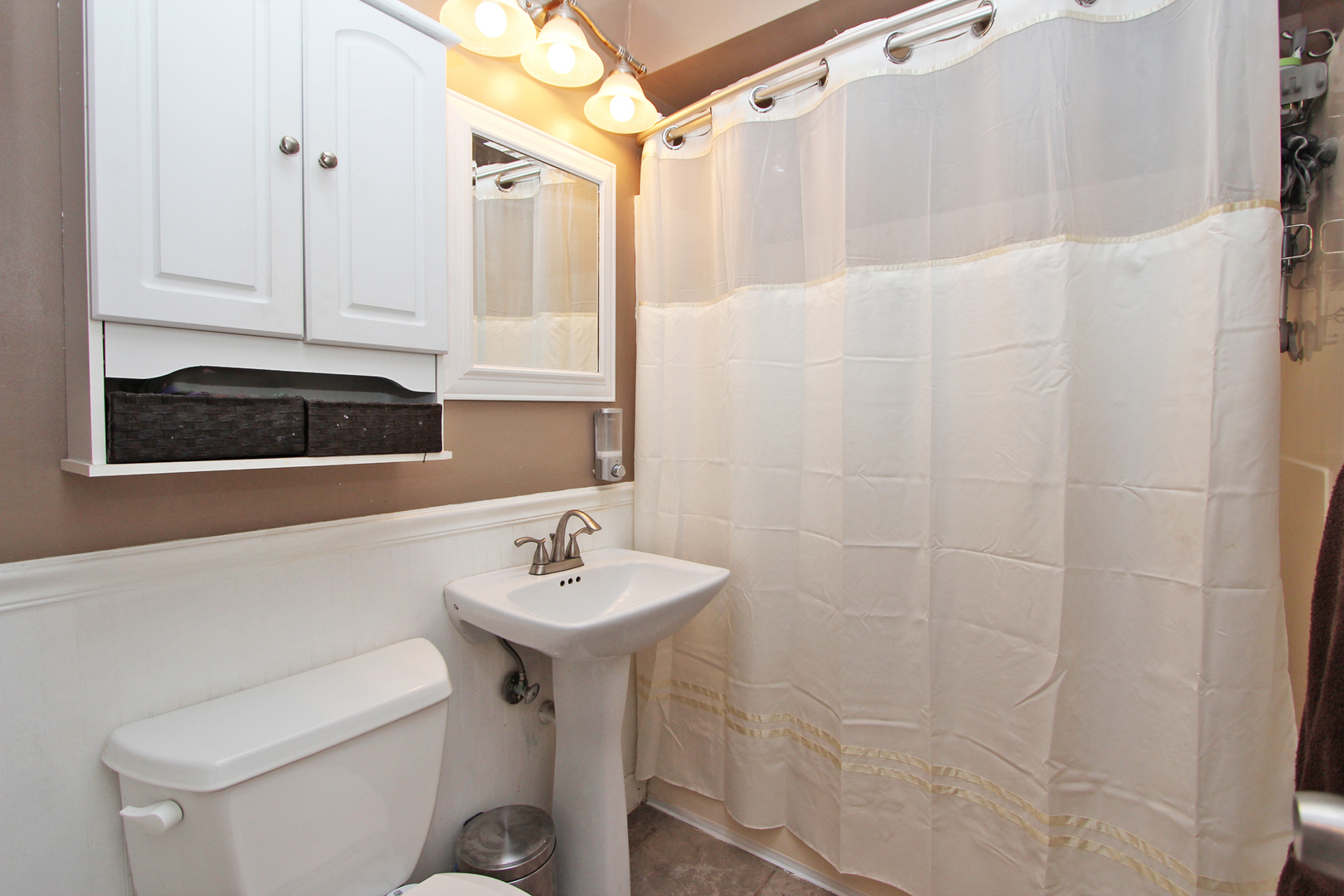 43 Golfview Road Lake Zurich, IL 60047 - Photo 22 of 35 a bathroom with a sink and mirror with toilet