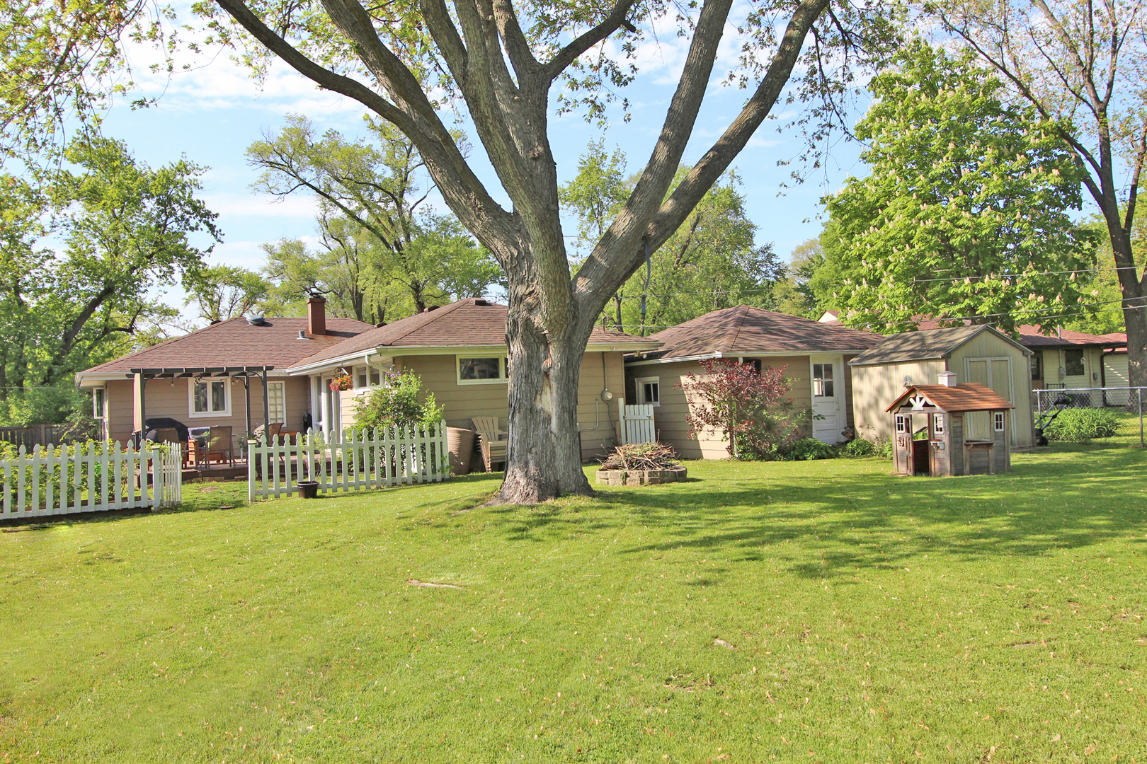 43 Golfview Road Lake Zurich, IL 60047 - Photo 23 of 35 a front view of a house with yard porch and outdoor seating