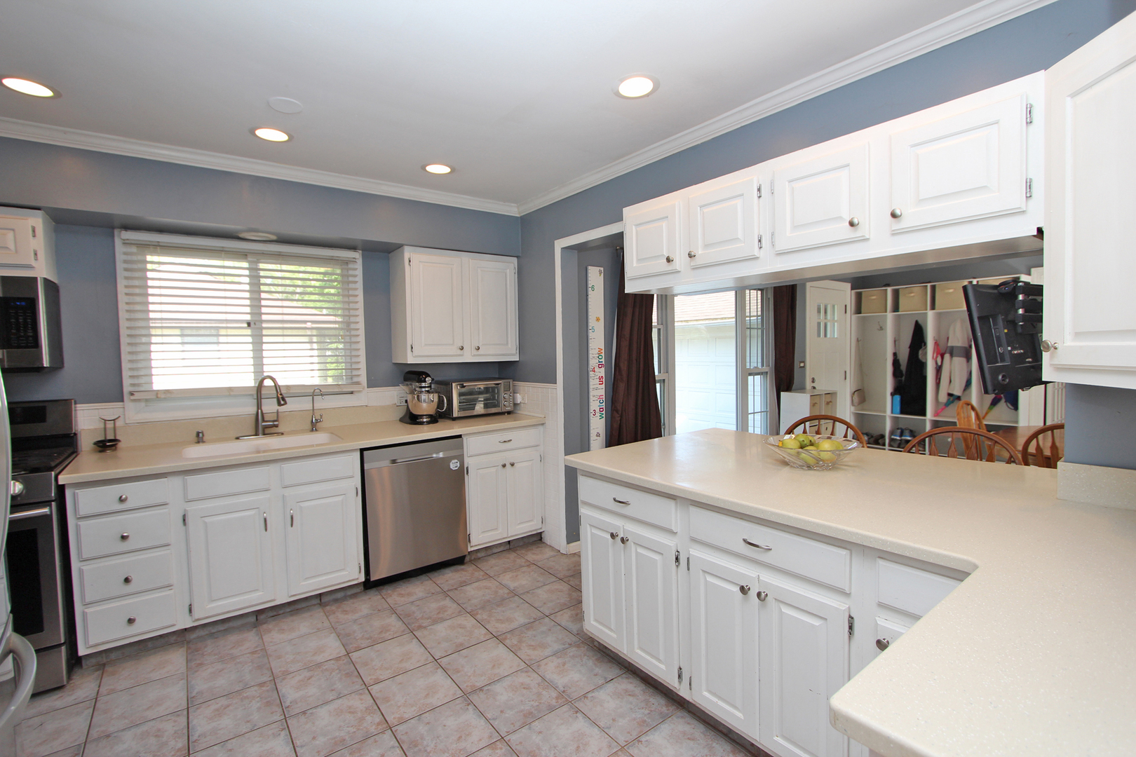 43 Golfview Road Lake Zurich, IL 60047 - Photo 6 of 35 a kitchen with sink cabinets and window