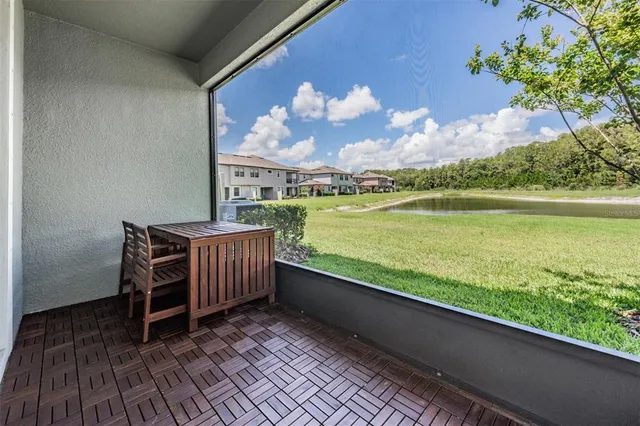 a view of a balcony with lake view