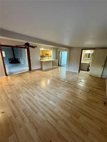 a view of kitchen with wooden floor