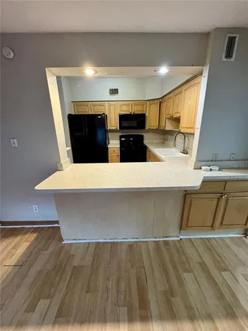 a view of a hallway view with staircase