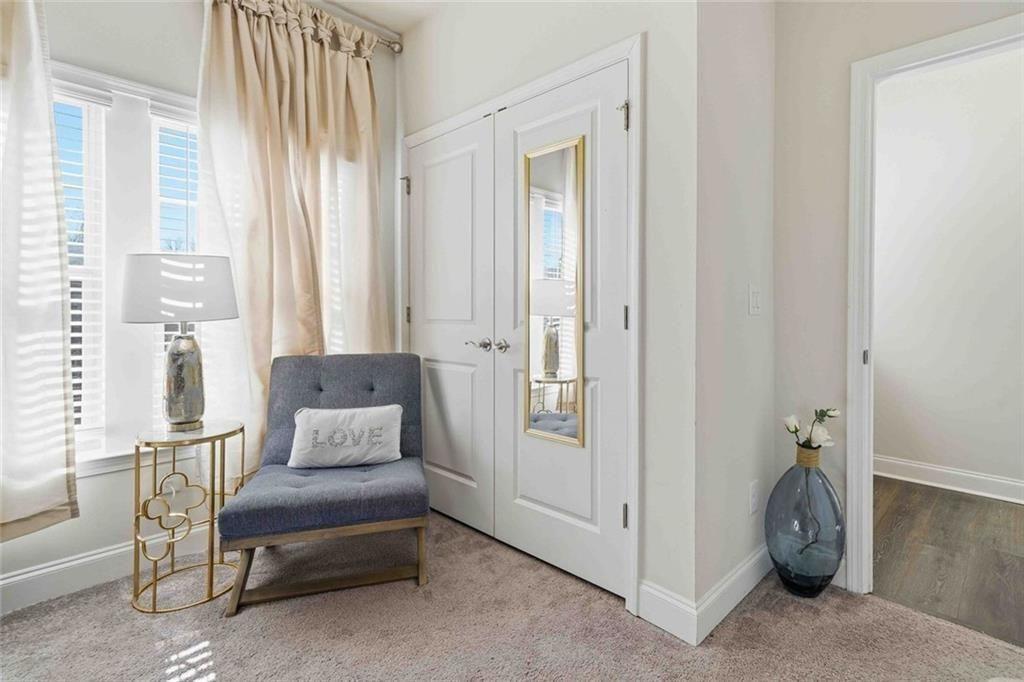 4631 Leader Lane Duluth, GA 30096 - Photo 28 of 55 a view of a livingroom with furniture and a window