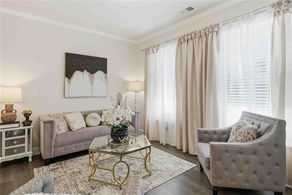4631 Leader Lane Duluth, GA 30096 - Photo 4 of 55 a living room with furniture and a window