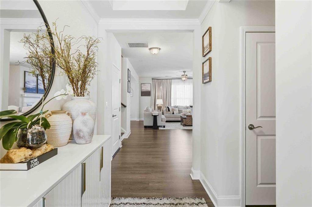 4631 Leader Lane Duluth, GA 30096 - Photo 7 of 55 a living room with furniture and a table