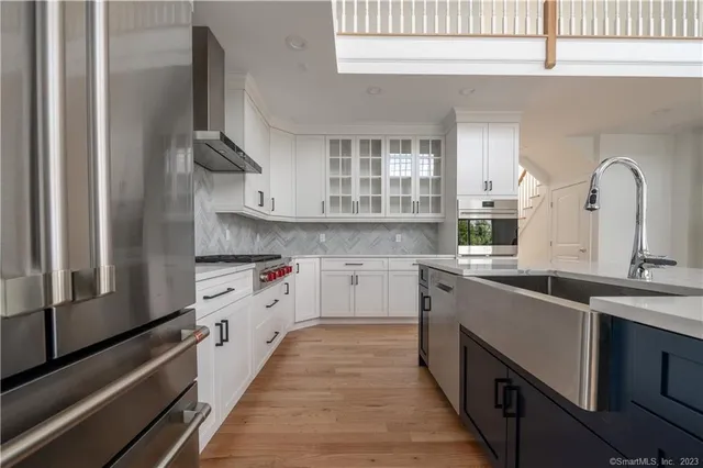 a bathroom with a shower and a sink