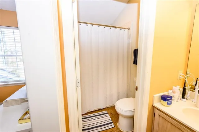 a bathroom with a sink and a toilet