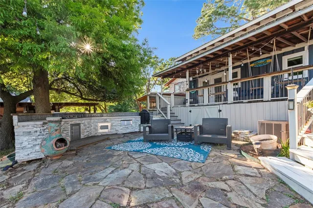 a view of house with outdoor seating space