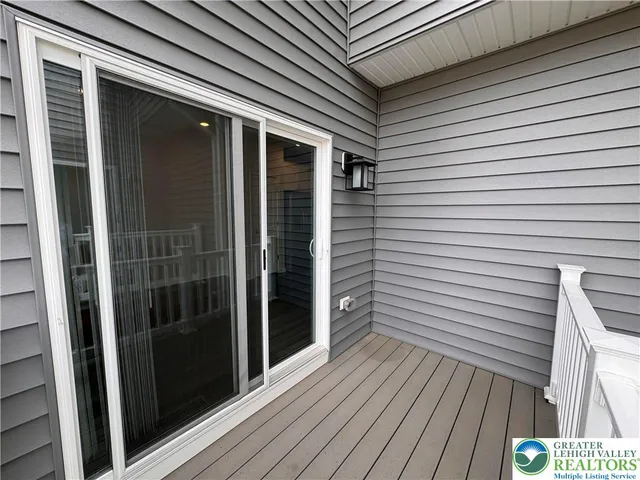 a view of a brick house with wooden floor