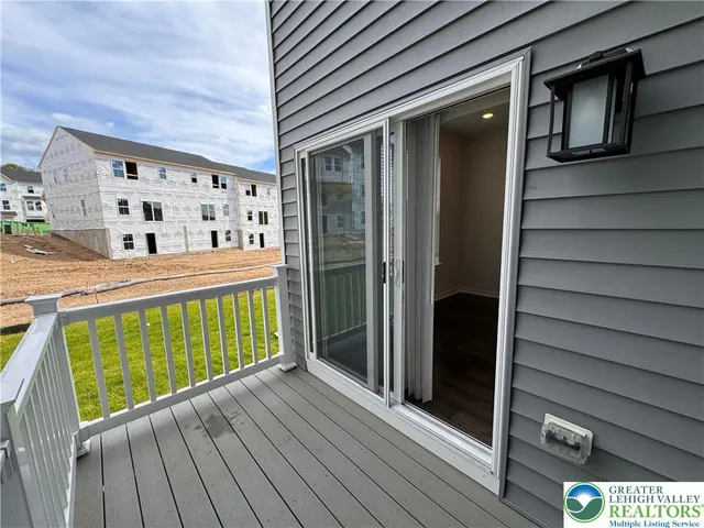 a view of a balcony with door
