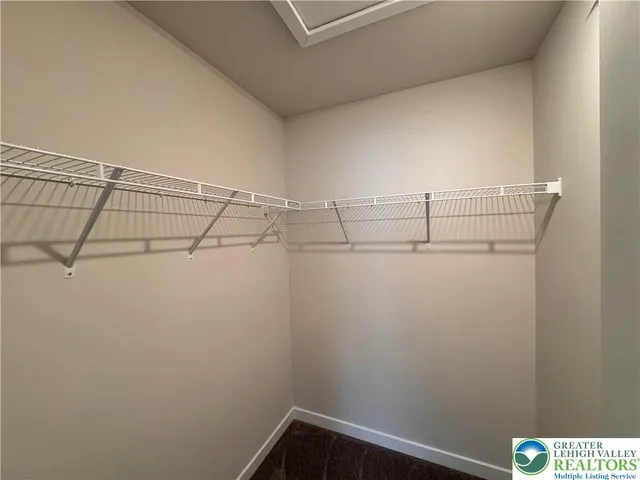 a view of a room with racks on the wall