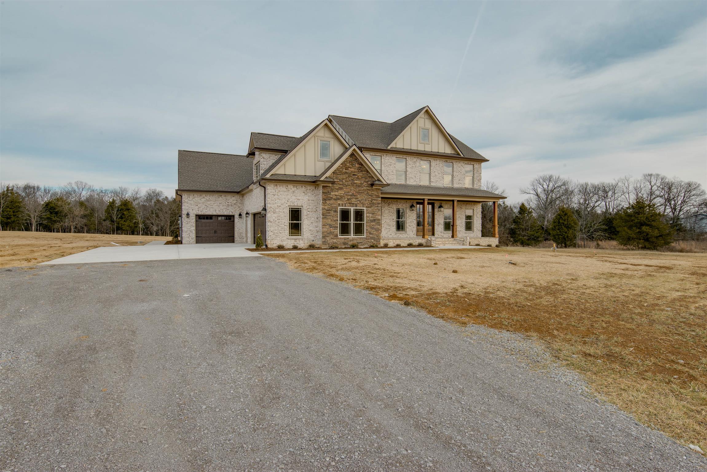 6988 Williams Road Christiana, TN 37037 - Photo 1 of 30 This home features a beautiful lot on quiet established road. This home has beautiful full green trees in season. Also this home has oversized turnaround and sidewalks that connect front and back of home.