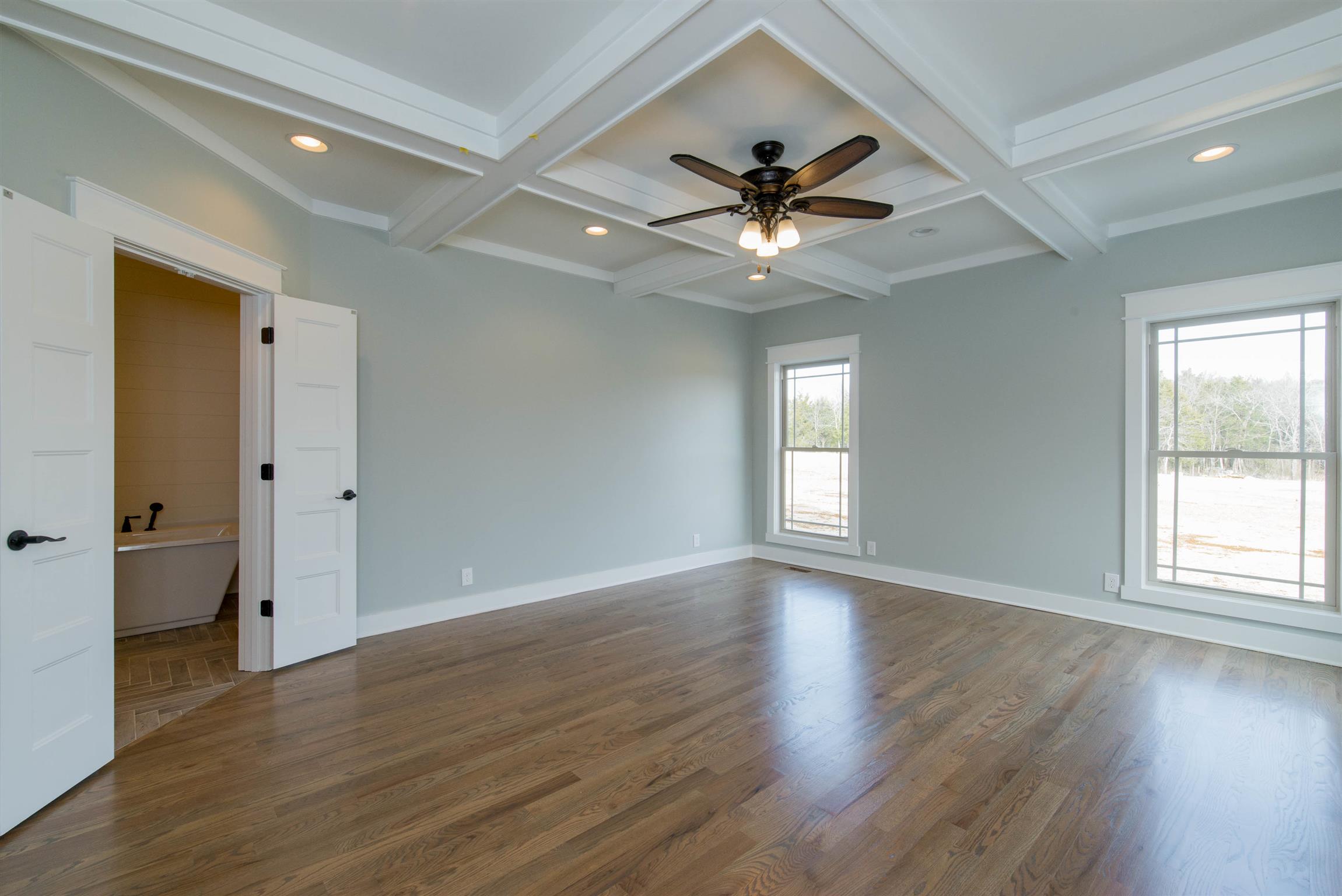 6988 Williams Road Christiana, TN 37037 - Photo 15 of 30 Master bedroom features an amazing coffered ceiling and lots of natural light. Also features view to the backyard.