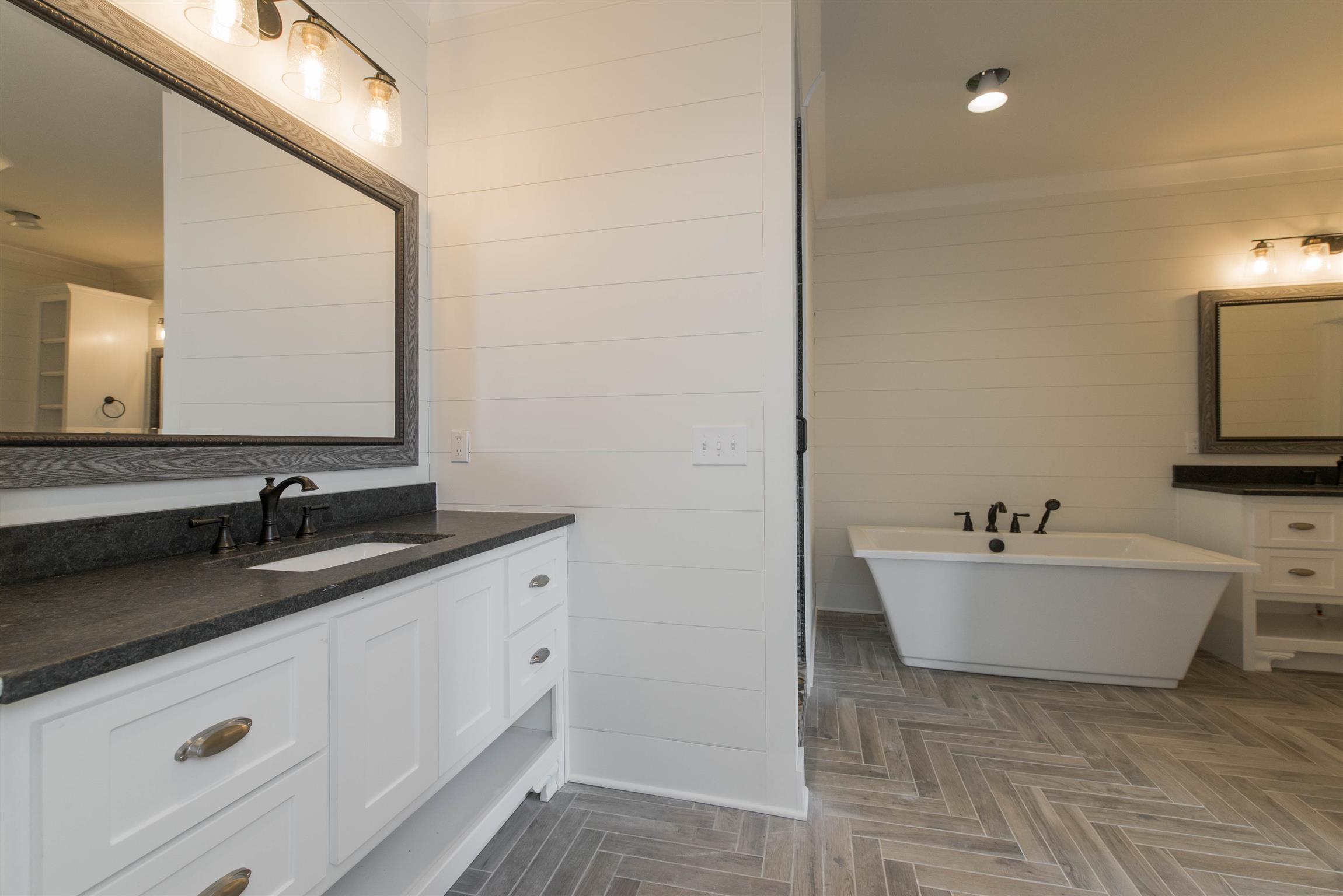 6988 Williams Road Christiana, TN 37037 - Photo 17 of 30 SHIPLAP WALLS! CUSTOM TILE FLOORING LAYED IN HERRINGBONE PATTERN.