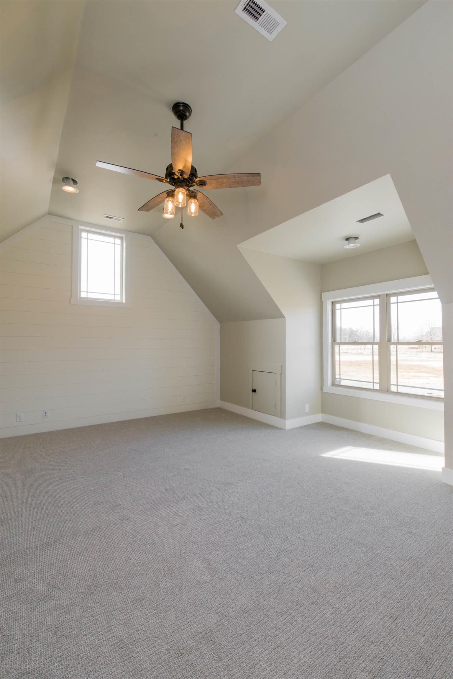 6988 Williams Road Christiana, TN 37037 - Photo 22 of 30 View of bonus room 1 with shiplap feature wall.