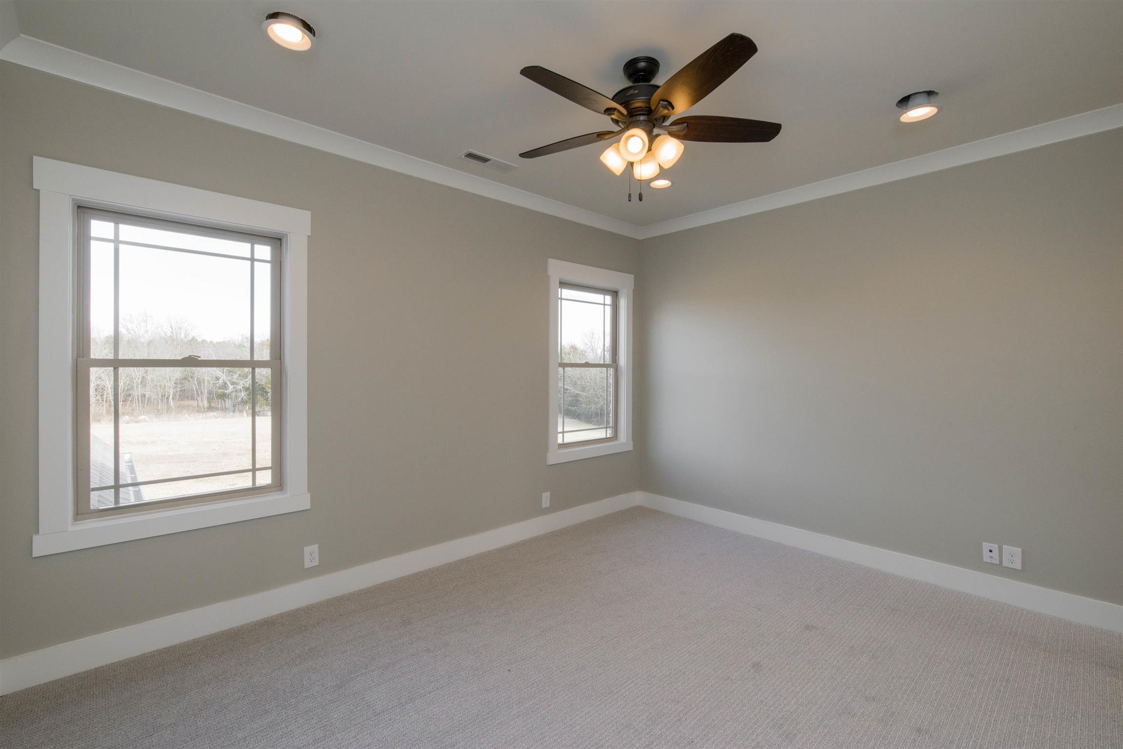 6988 Williams Road Christiana, TN 37037 - Photo 27 of 30 Back bedroom wtih walk in closet and custom shelving. This bedroom shares bathroom with front bedroom.