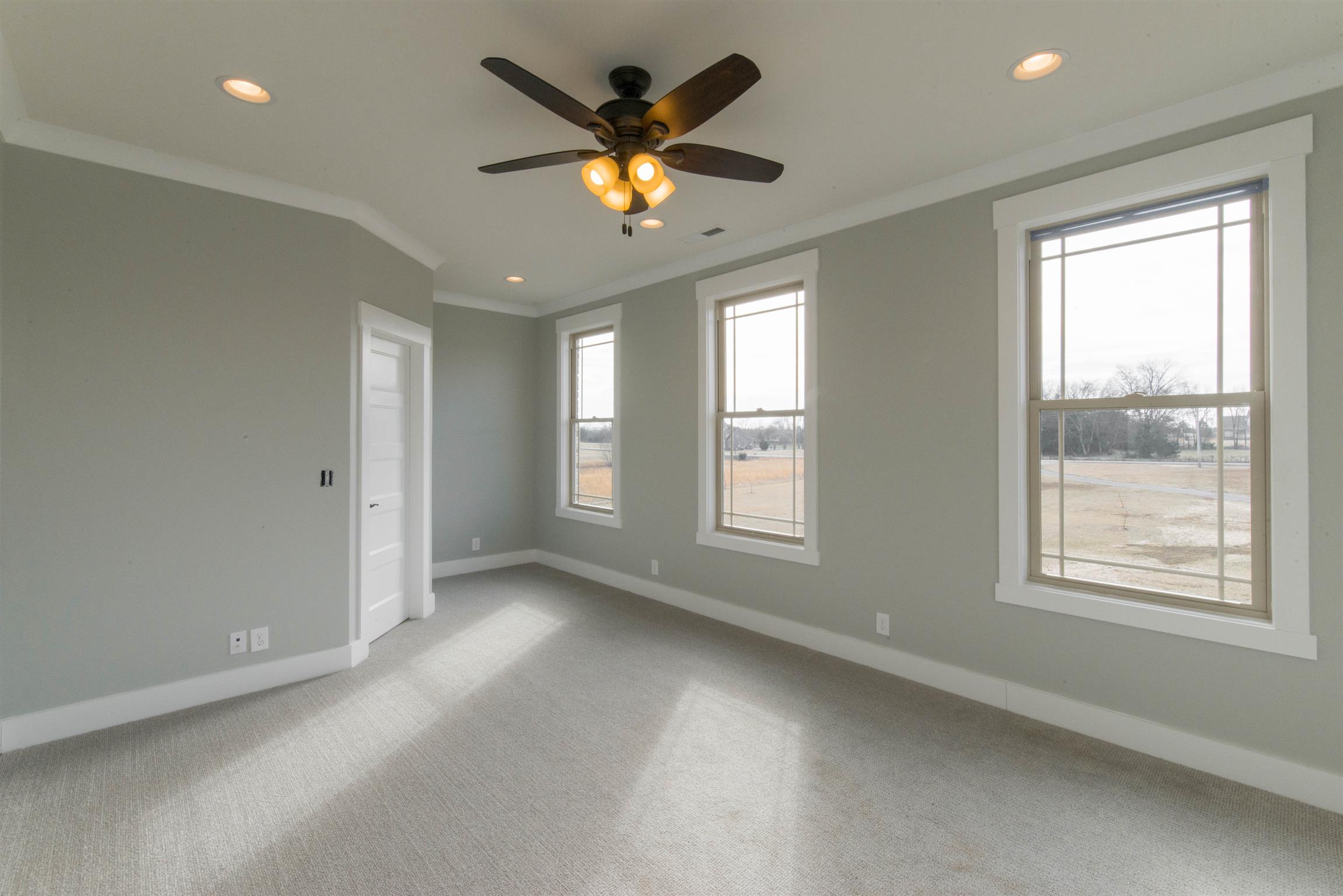 6988 Williams Road Christiana, TN 37037 - Photo 29 of 30 Additional room upstairs featuring beautiful windows with lots of natural light. Also features closet with custom shelving for storage.