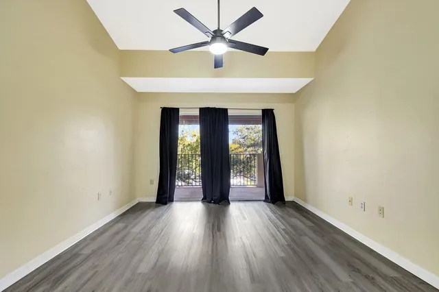a view of washer and dryer with kitchen in the background