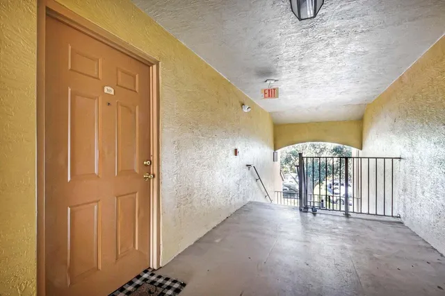 an aerial view of house with yard and lake view