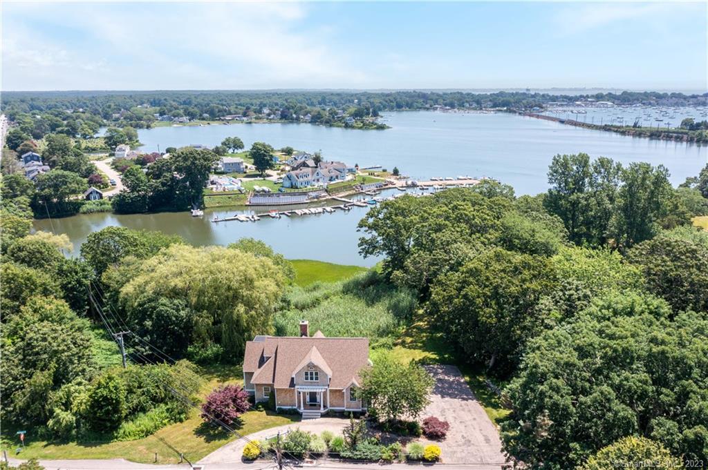 5 Wamphassuc Road Stonington, CT 06378 - Photo 1 of 1 an aerial view of a house with outdoor space and lake view